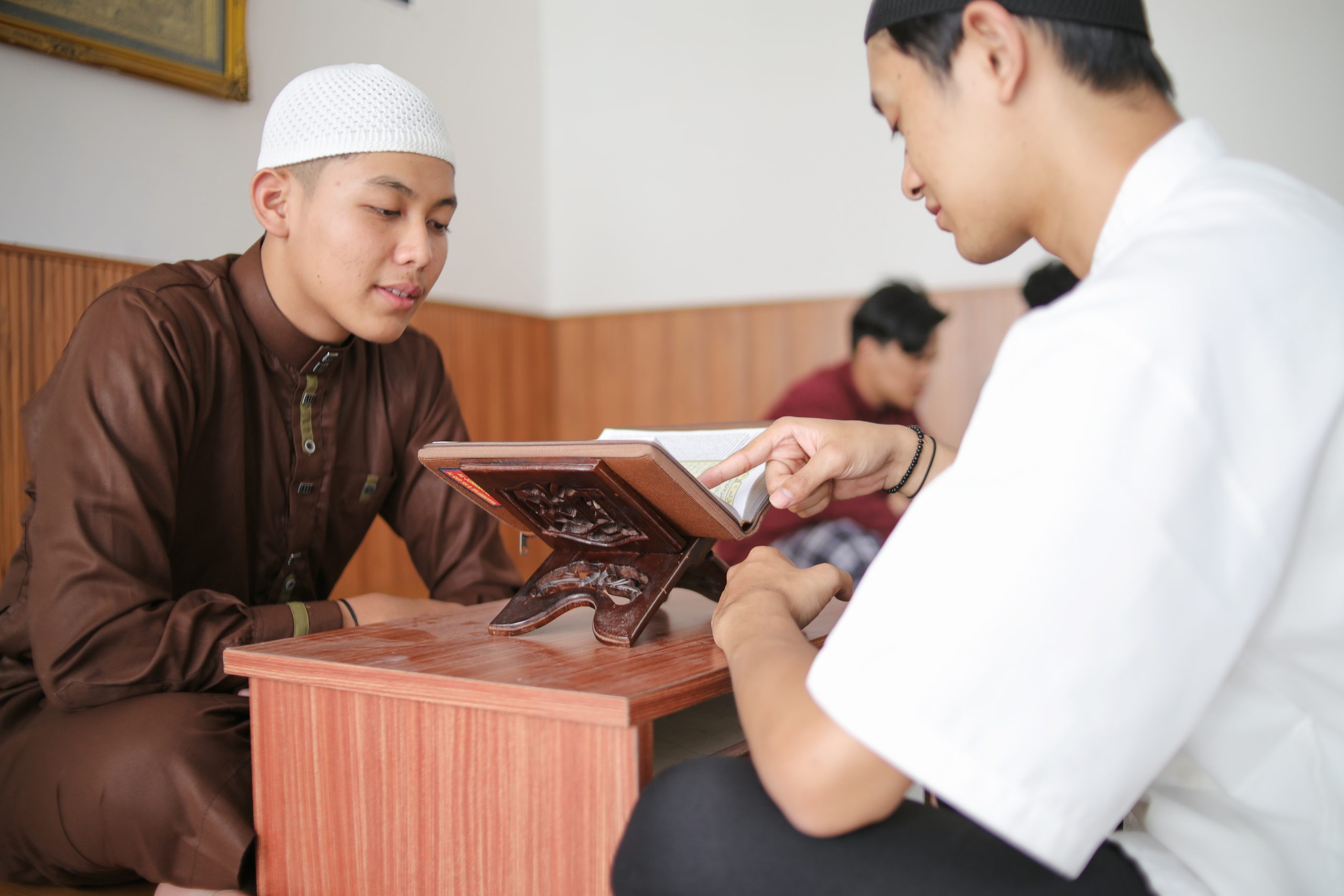 Young Muslim Man Raising Hands Focus To Pray At The Mosque